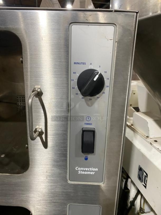 Cleveland Range 24CEM24 commercial convection steamer, stainless steel, 6-pan dual-compartment, timer dial, boiler base, 208/220V 3 phase.