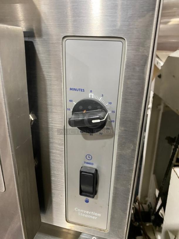 Cleveland Range Classic Series stainless steel convection steamer control panel; timer dial and switch visible.