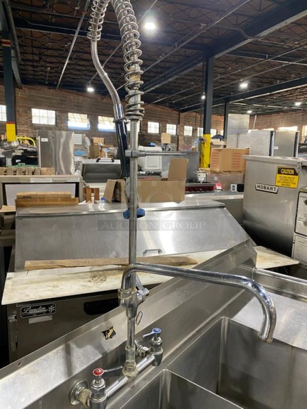Duke Manufacturing stainless steel 3-compartment dishwashing sink with left/right drainboards, backsplash, and swing spout.