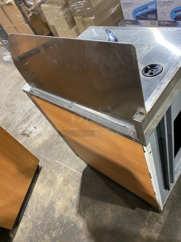 Duke Manufacturing stainless steel hand washing cabinet, model SUBPS24CM, with back and right-side splash. Excellent condition.