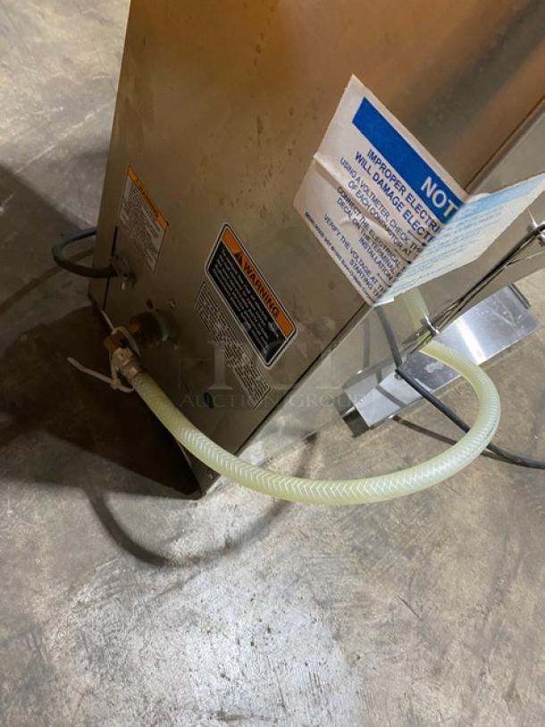 Bunn Infusion Series ITCB-DV brewer, stainless steel, digital controls, power cord, labels visible, used condition.