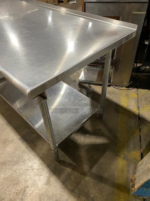Duke Manufacturing stainless steel worktop prep table, model DC-7202-6030, with undershelf and trash chute cut-out.