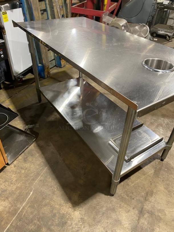 Duke Manufacturing stainless steel prep table, model DC-7202-6030, with undershelf and round trash chute, on sturdy legs.