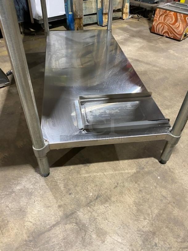 Duke Manufacturing stainless steel prep table with undershelf, model DC-7202-6030. Features trash chute cut-out, on legs.