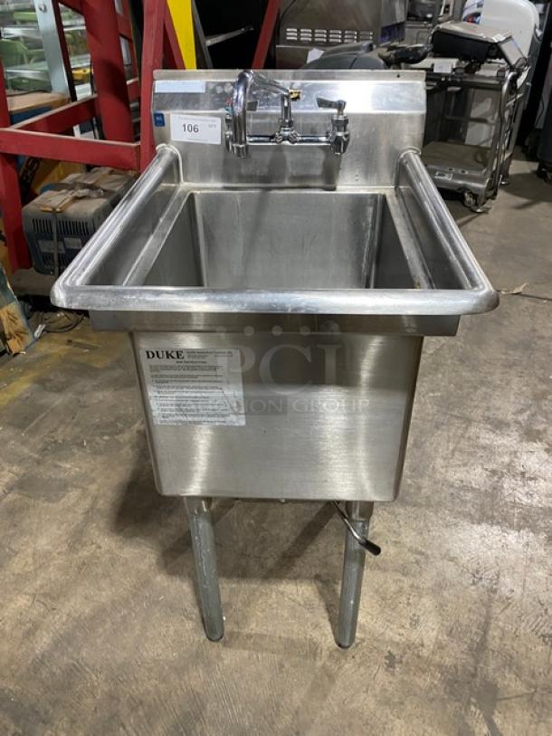 Duke Manufacturing stainless steel single compartment sink with backsplash, swing spout faucet, and sturdy legs.