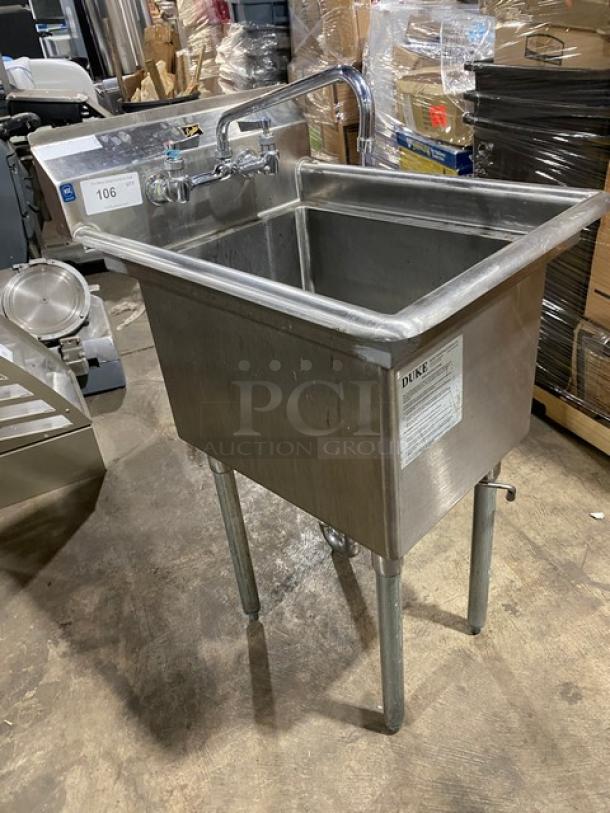 Duke Manufacturing stainless steel sink with backsplash, swing spout faucet, and legs. Appears in used condition.