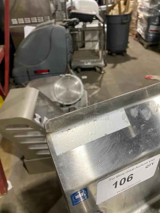 Duke Manufacturing stainless steel commercial sink with backsplash, swing spout faucet, and legs. Condition appears used, NSF sticker visible.