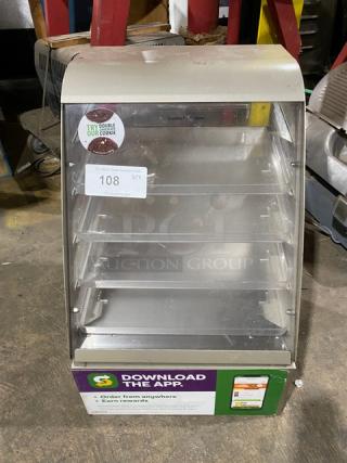 Subway-style commercial dry multi-tier countertop dessert merchandiser with clear pull-out trays, labels, and app promotion.