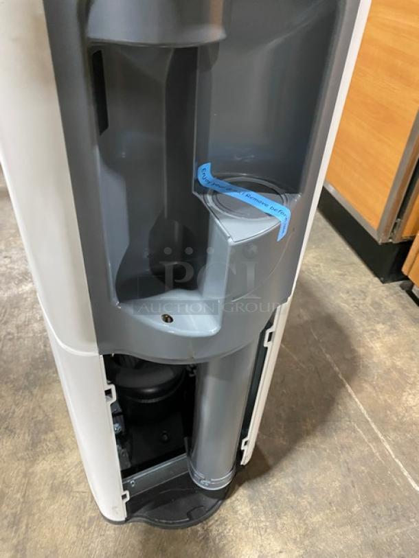 Cosmetal Connect23A free-standing electric water dispenser, 115V, filtered, commercial use, internal components visible.