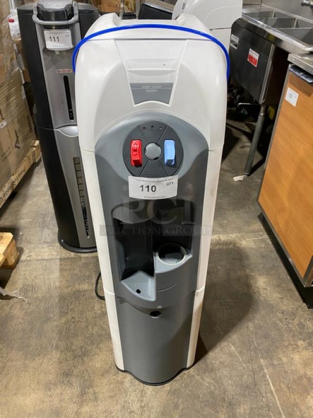 Cosmetal Connect23A electric free-standing water dispenser, 115V, features hot and cold taps, condition appears used.