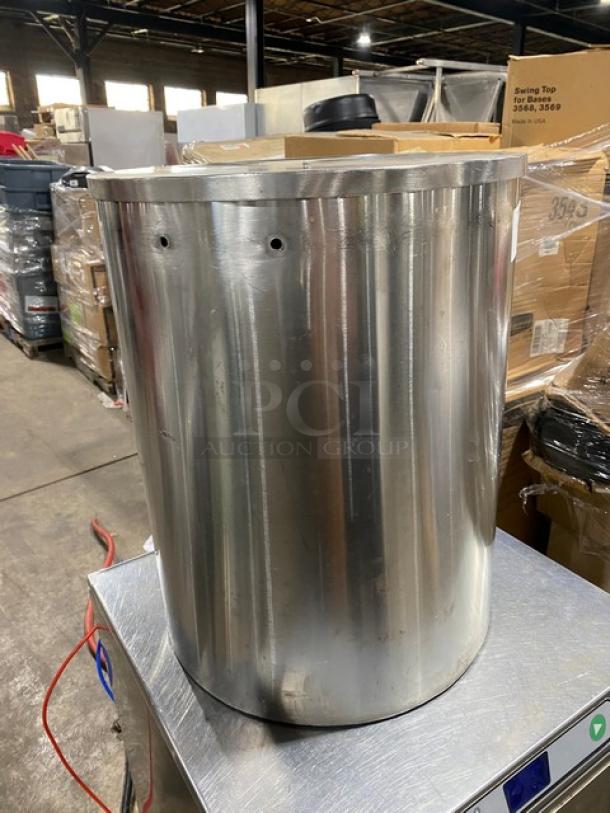 Commercial stainless steel round pan with flat lid, large capacity, durable construction, good condition.