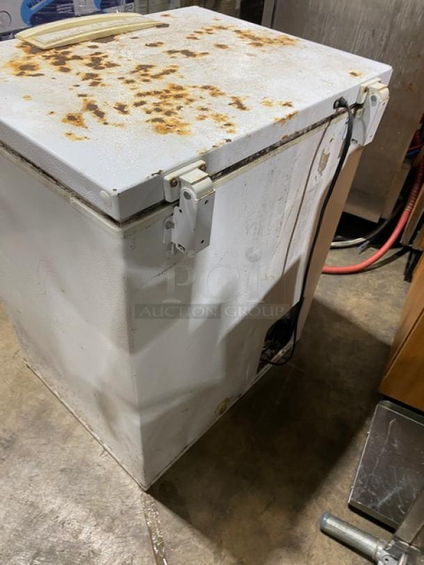 Kenmore Commercial chest freezer, model 2539155110, in worn condition with rust on the lid. 115V power supply.