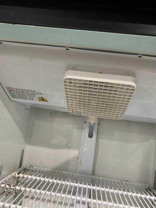 Avantco commercial glass door refrigerator, model 178GDC15HCB, featuring LED lighting and poly coated rack, in used condition.