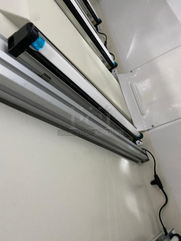 Urban Cultivator Commercial indoor garden, white, double glass doors, model Commercial001, with electric power and casters.