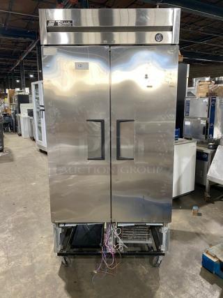True T-35 commercial stainless steel 2-door reach-in refrigerator. Includes wired rack, casters, SN: 8784235, 115V, 1 phase.