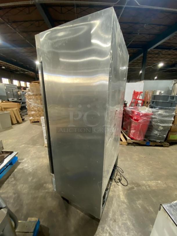 True T-35 commercial stainless steel refrigerator, 2 solid doors, wired rack, on casters, 115V 1 phase, SN: 8784235.