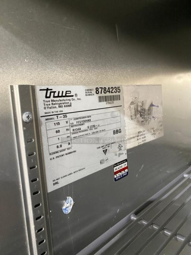 True T-35 Commercial 2 Door Refrigerator, stainless steel, wired rack, Model T-35, SN: 8784235, 115V, with casters.