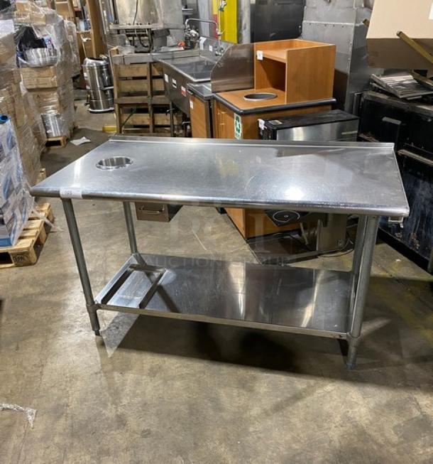Duke Manufacturing stainless steel prep table, model DC-7202-6030, with undershelf and round waste chute, on legs.