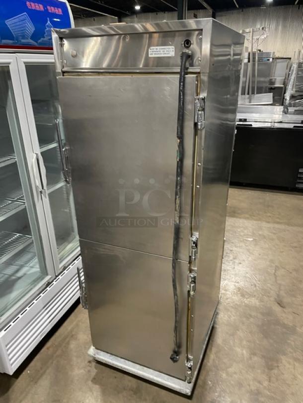 Henny Penny HC-900 commercial heated holding cabinet, stainless steel, half door, built-in pan slides, on casters.