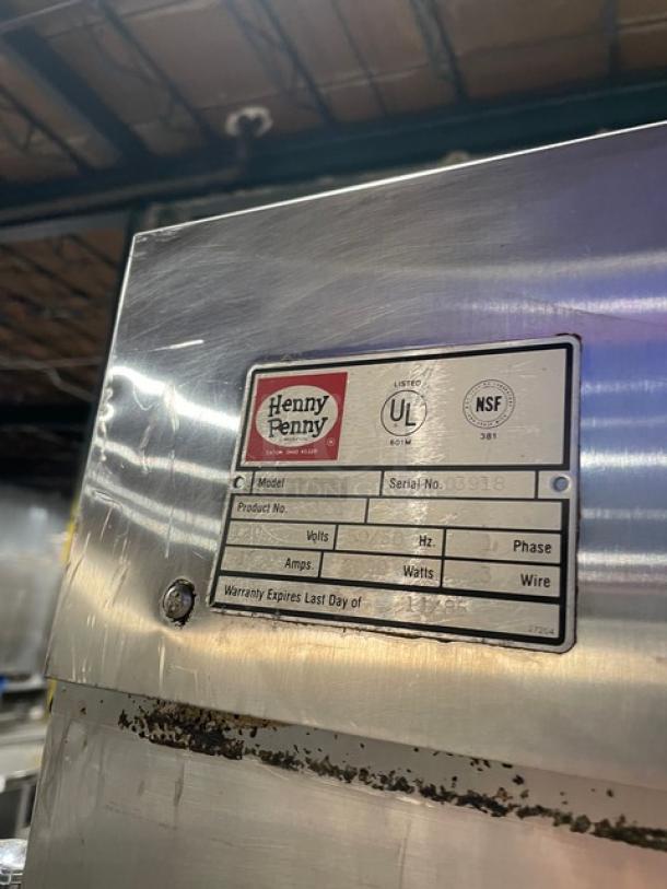 Henny Penny HC900 stainless steel heated holding cabinet, half door, insulated, built-in pan slides, on casters, SN: 03918.