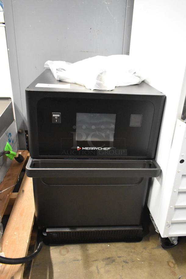 Brand new Merrychef eikon e1s high-speed cooking oven, metal finish, 208/240V, 1 phase, minor scratches, in original packaging.