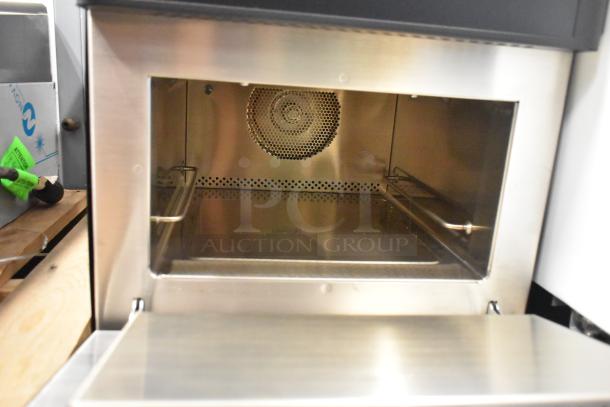 Brand new 2024 Merrychef eikon e1s high-speed countertop oven, metal interior, scratch and dent, 208/240V, 1 phase.