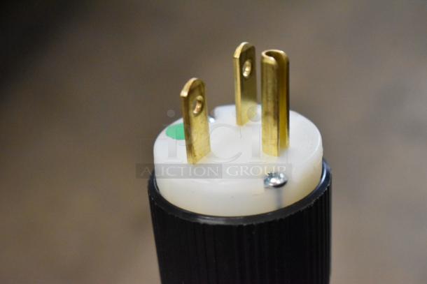 Alt text: Close-up of a three-prong electrical plug associated with the Merrychef eikon e1s oven, designed for 208/240 volts, 1 phase.