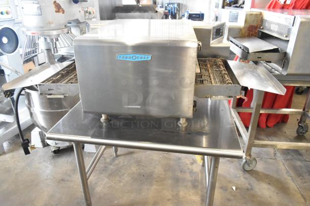Turbochef HhC1618 stainless steel countertop rapid speed conveyor oven, 208/240 volts, in good condition.