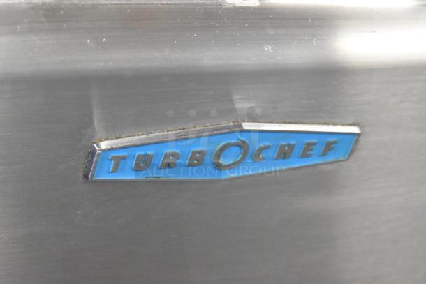 Turbochef HhC1618 stainless steel conveyor oven, commercial countertop model. Visible logo, 208/240 volts, 1 phase.