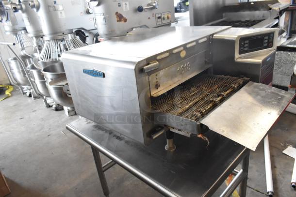 Turbochef HhC1618 stainless steel conveyor oven, commercial countertop model, 208/240V, in used condition.