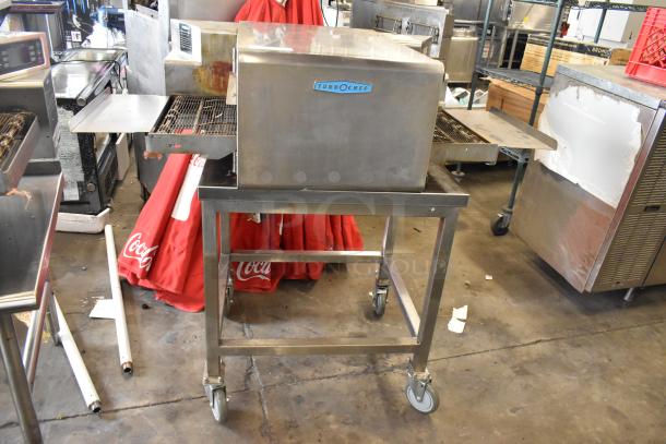 Turbochef HhC1618 stainless steel conveyor oven on stand, 208/240V, 1 phase, commercial countertop model, used condition.