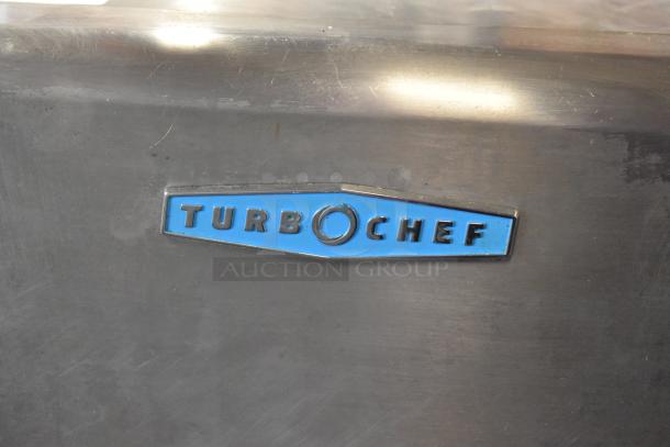 Turbochef HhC1618 stainless steel commercial rapid speed conveyor oven, features vivid blue Turbochef logo.