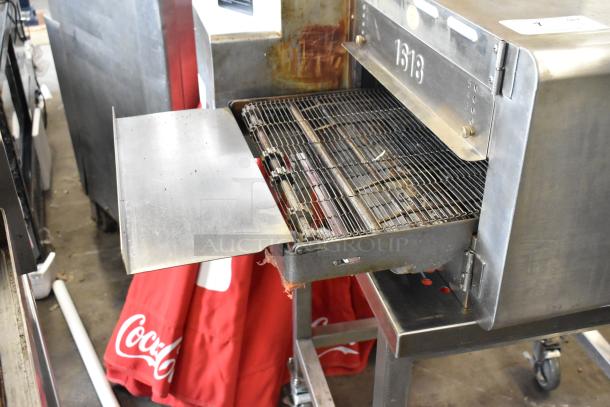 Turbochef HhC1618 stainless steel rapid speed conveyor oven on equipment stand, 208/240V, 1 phase, with visible conveyor and control markings.