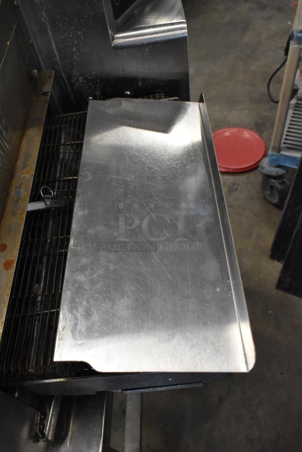 2022 Turbochef HhC1618 stainless steel conveyor oven on stand with commercial casters, showing oven surface detail.