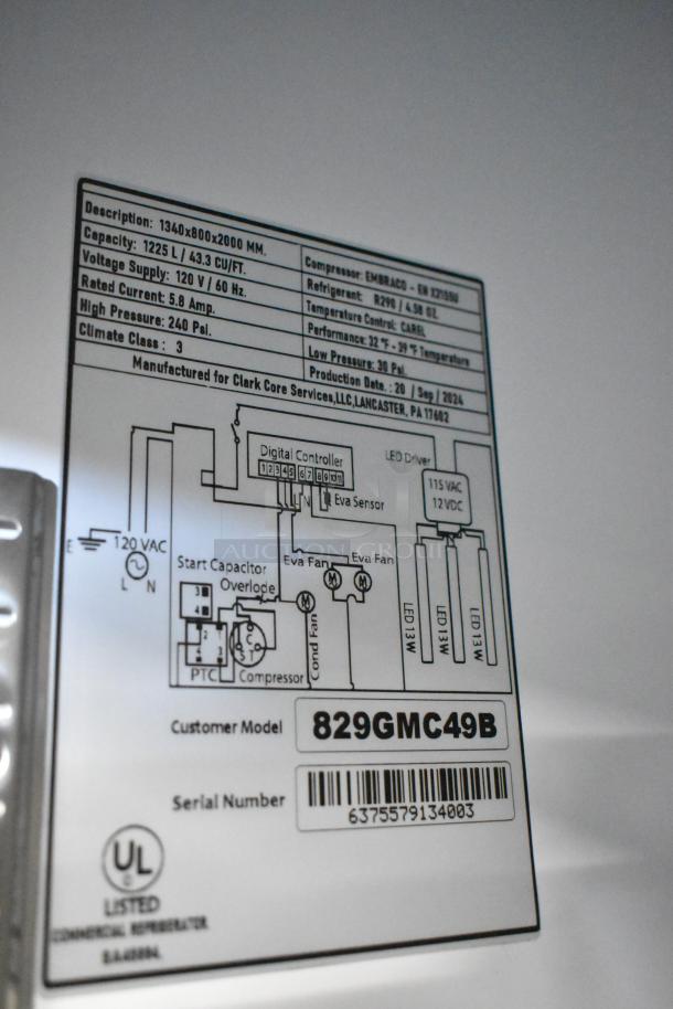 Brand new Mainstreet 829GMC49B 2-door cooler, 115V, scratch and dent. Metal exterior, poly racks. Model label visible.