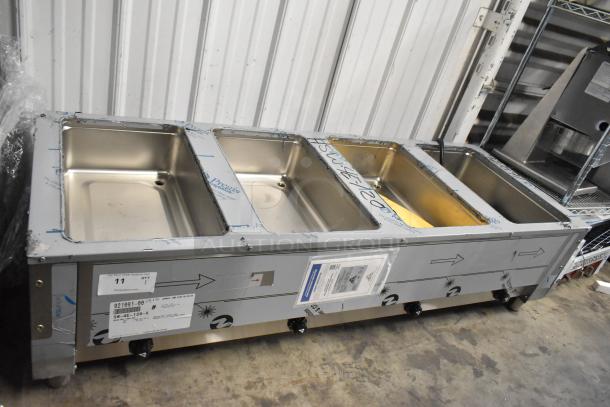 BRAND NEW Advance Tabco SW-4E-120-X four pan electric hot food table with undershelf, minor scratches and dents visible.