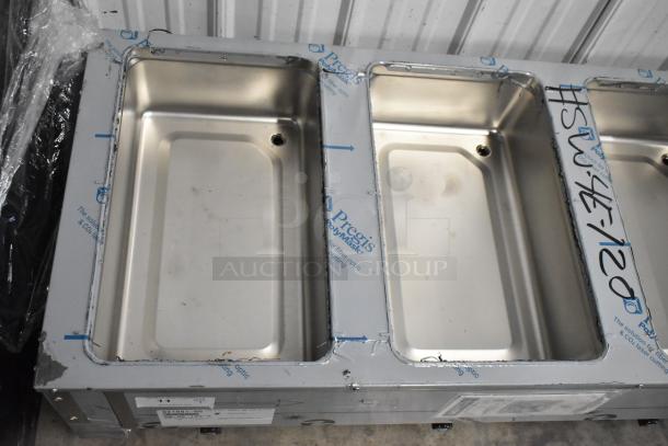 Advance Tabco SW-4E-120 four pan electric hot food table, new with scratch and dent, protective film, and undershelf.