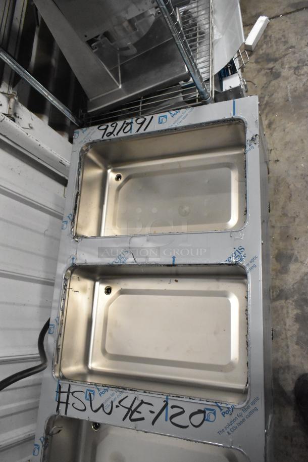 Brand new Advance Tabco SW-4E-120 four-pan electric hot food table with undershelf. Scratch and dent condition.