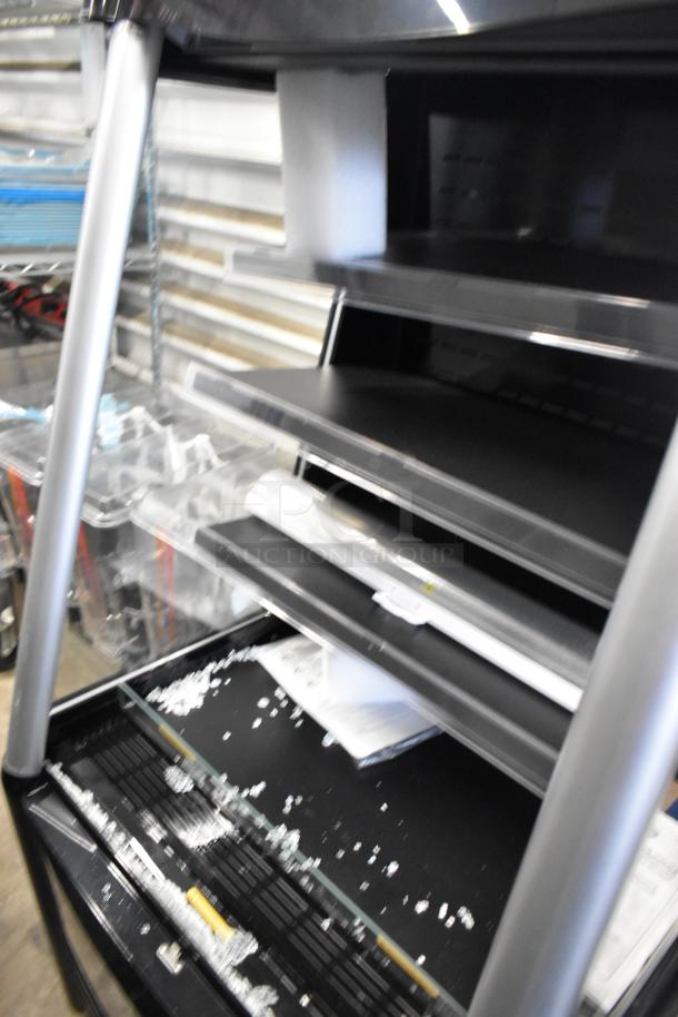 Brand new Avantco 193MAC26HCB 28" black air curtain merchandiser. Scratch and dent, commercial casters, 115V, 1 phase.