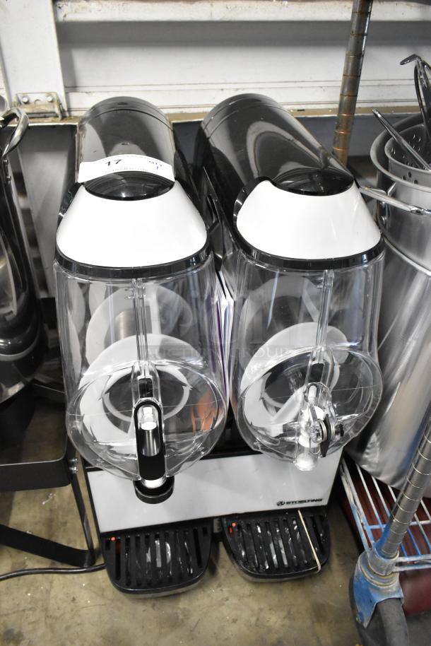 Brand new Stoelting SCBF128-37 commercial frozen beverage machine, dual 2.6-gallon capacity, 115V, with minor scratches.