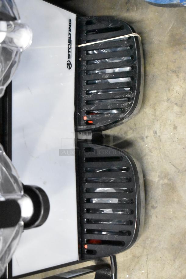 Brand new Stoelting SCBF128-37 frozen beverage machine, 2.6-gallon capacity, metal, 115V, with visible branding and controls.