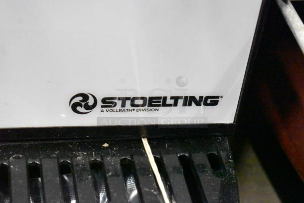 Brand new Stoelting SCBF128-37 frozen beverage machine. 2.6-gallon capacity, visible "Stoelting" logo, minor scratches. 115V. 