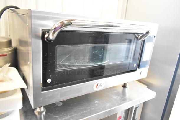 Brand new Cooking Performance Group HSIO-H electric ventless high-speed oven, stainless steel, broken glass visible, 208/240 volts.
