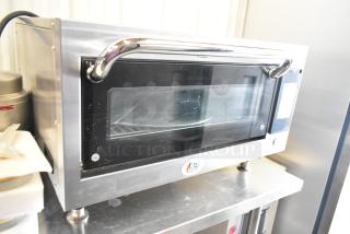 Brand new Cooking Performance Group HSIO-H electric ventless high-speed oven, stainless steel, broken glass visible, 208/240 volts.