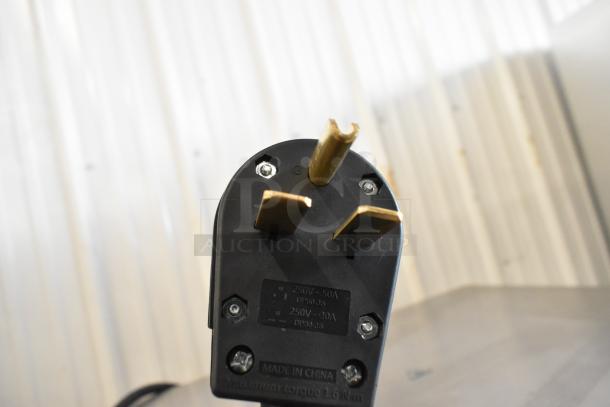 Plug of Cooking Performance Group HSIO-H Electric Ventless Oven. Label indicates 250V-50A, made in China.