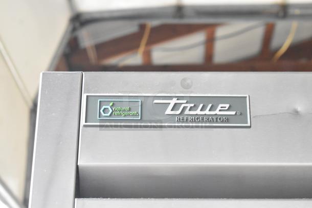 2017 True T-35-HC stainless steel commercial cooler, 2 doors, poly coated racks, natural refrigerant label.