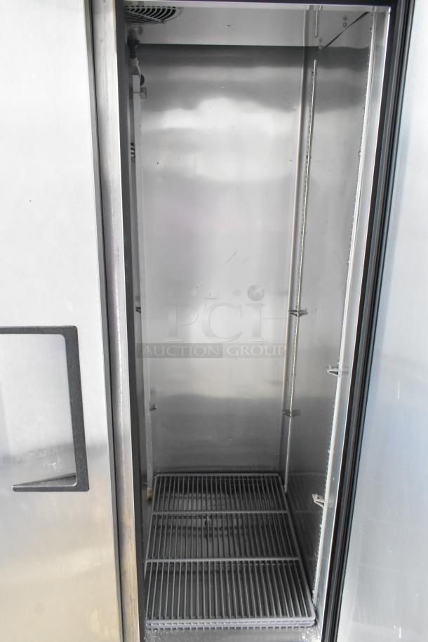 2017 True T-35-HC stainless steel 2-door reach-in cooler, poly-coated racks, 115V, good condition. Commercial use.
