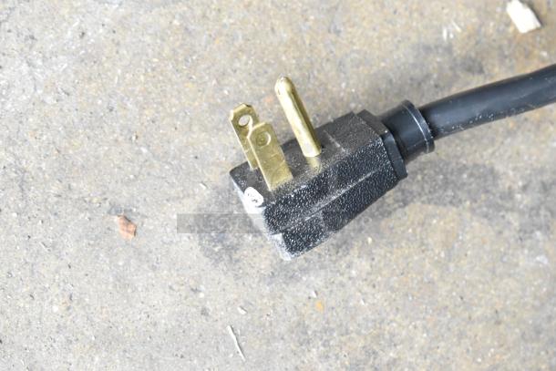 Power plug for 2017 True T-35-HC Stainless Steel Commercial 2-Door Reach-In Cooler, black with gold prongs.