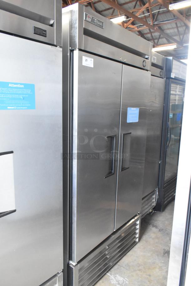 2016 True T-35 Stainless Steel Commercial 2 Door Reach-In Cooler with poly coated racks and commercial casters. Model T-35.