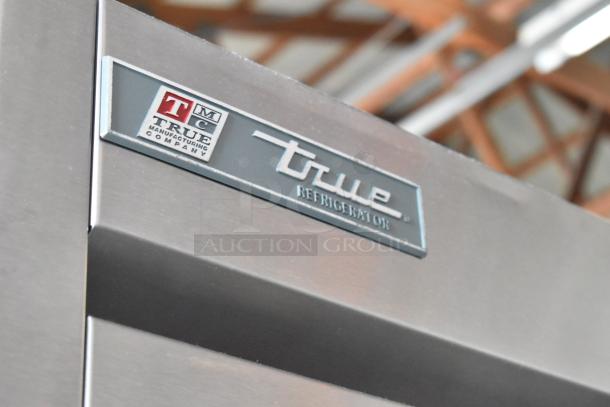 2016 True T-35 Stainless Steel 2-Door Cooler with poly coated racks, commercial casters, 115V, 1 phase.